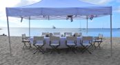 barbecue dining set up on the beach