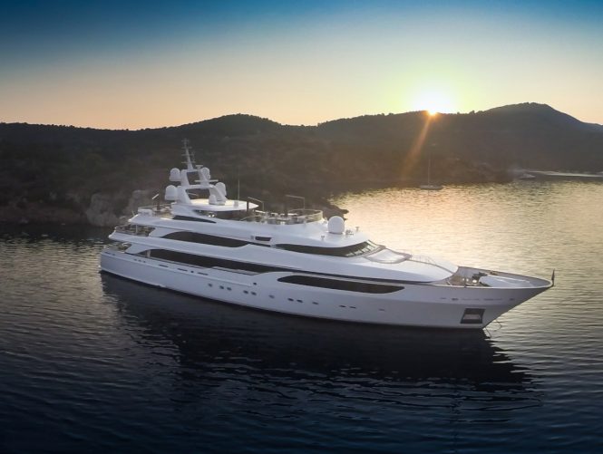 LIONESS V yacht at sunset