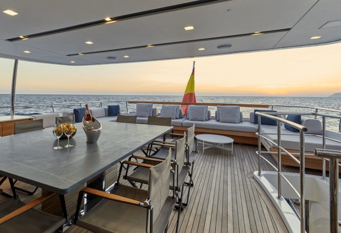 Aft deck alfresco dining area with seating