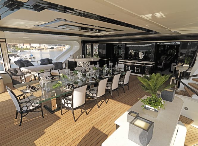 Aft deck alfresco dining set up to fully enjoy the Mediterranean summer