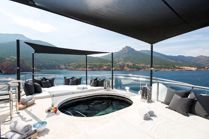 Fantastic Jacuzzi with sun pads and luxurious service during the entire charter vacation