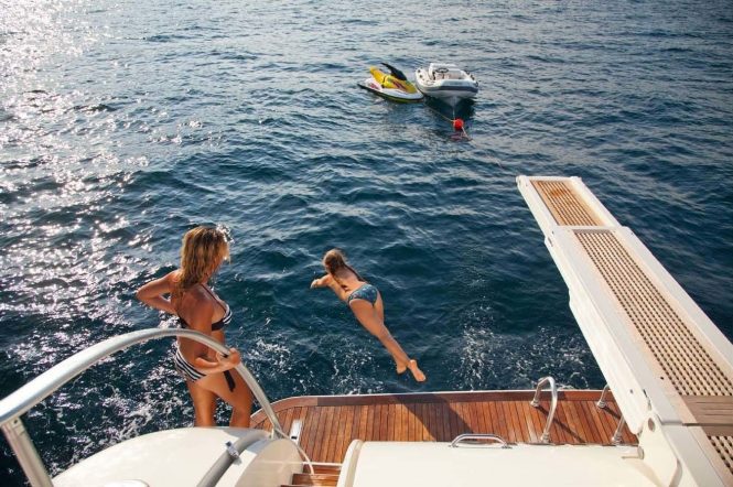 Fun with toys on a yacht charter