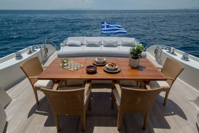 aft deck with alfresco dining option and seating