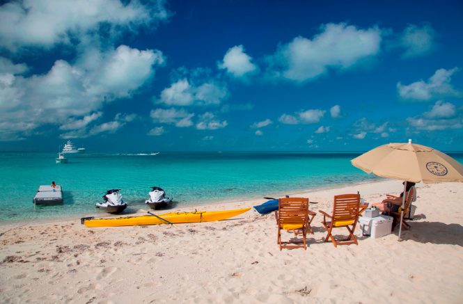 Beach fun with Marcato expedition yacht in Highborne Cay, the Exumas, Bahamas