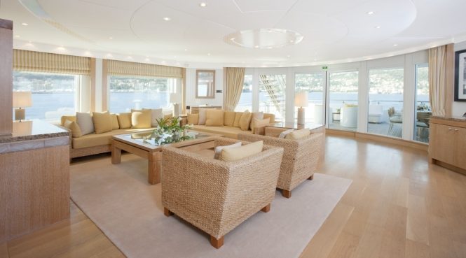 Bright and airy saloon with modern decor and furniture