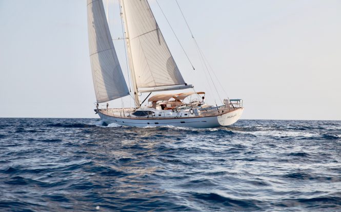 Midnight sailing yacht