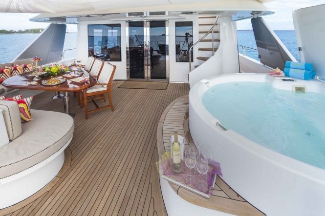 Aft deck with great alfresco dining area and a Jacuzzi hot tub