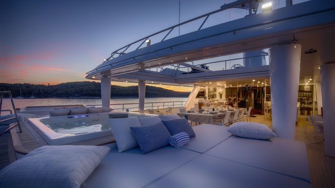 Spacious decks offering Jacuzzi and numerous dining and seating options