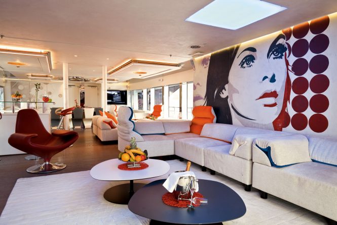 Spacious modern saloon with contemporary art and design
