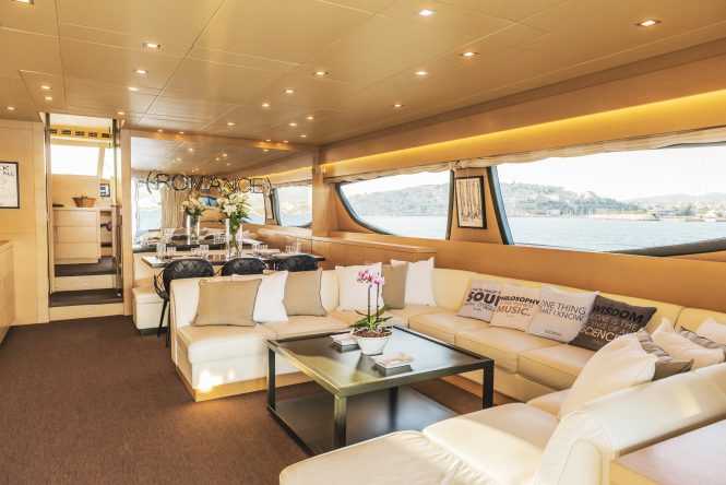 Beautiful and bright saloon with comfortable seating and elegant dining area