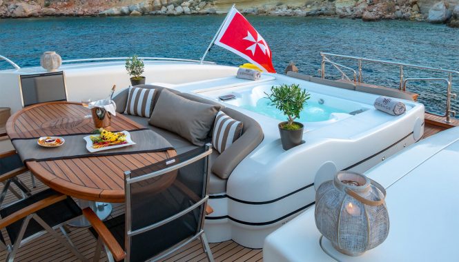 Relax in the on deck Jacuzzi or enjoy an alfresco meal