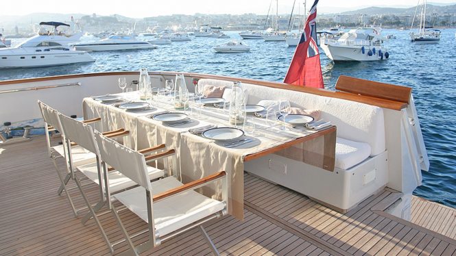 Aft deck with relaxed al fresco dining set up