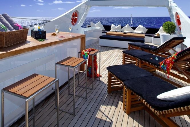 Flybridge offering a bar and sunbathing area