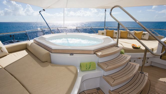 Jacuzzi on board with comfortable sunpads around
