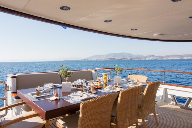 Fabulous alfresco breakfast eanjoying the warm Mediterranean breeze and beautiful view of the Greek islands