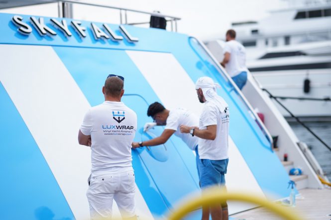 wrapping the transom - Photo © LuxWrap