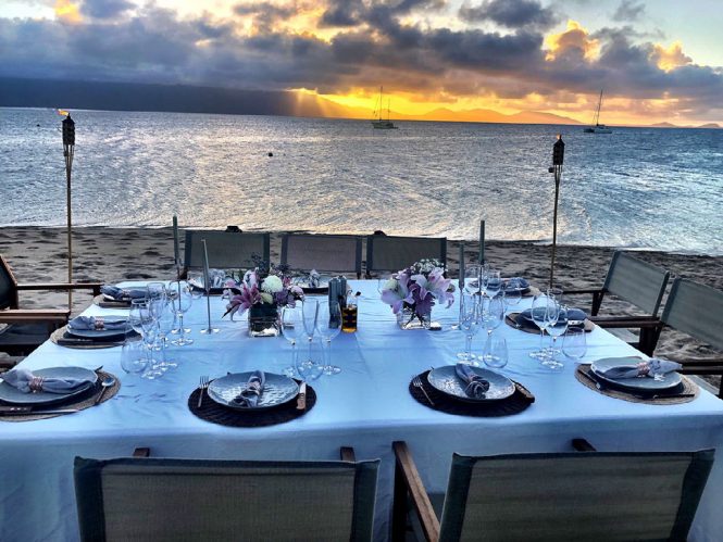 Beach set up for a relaxing alfresco dinner in style