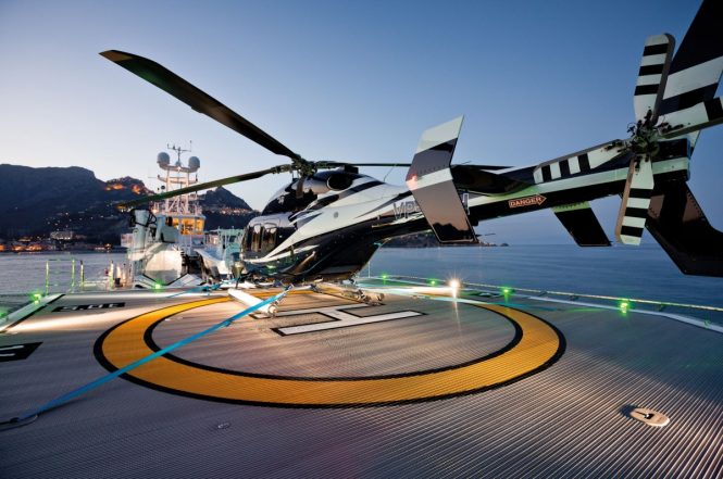 Helipad on a superyacht with a helicopter