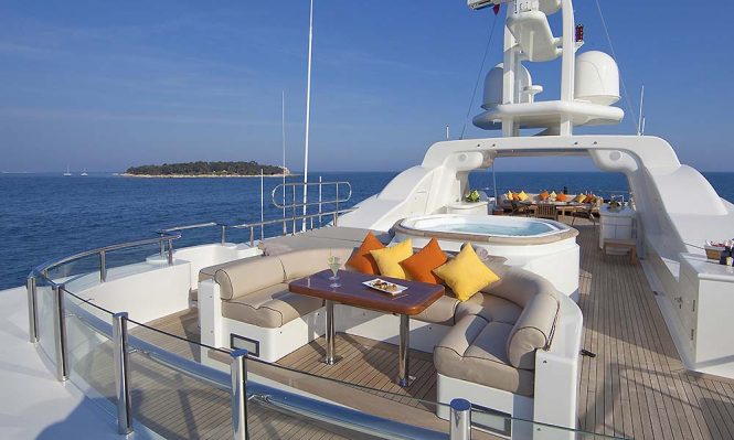 Sun deck has a large Jacuzzi and a sunbathing area