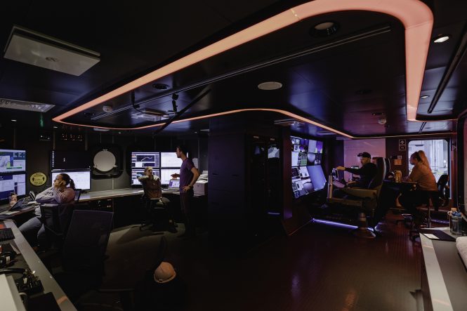 OceanX team is seen here in mission control where multiple teams collaborate and share information to make sense of their discoveries - Credit Taj Howe