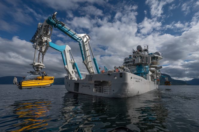 ROV being lowered into the Fjords of Norway - Photo Andy Mann