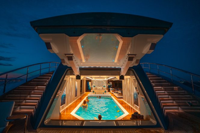 Spectacular beach club with a huge pool aboard mega yacht TATIANA