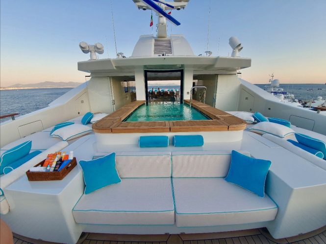 Pool with sunbathing area