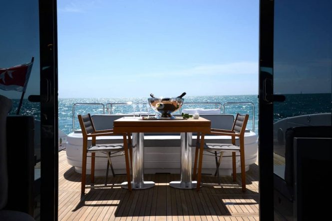 Elegant drinks and dining set up on board