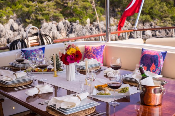 Dining aboard Queen of RTT yacht