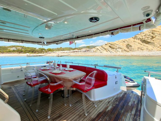Spacious aft deck with an alfresco dining area