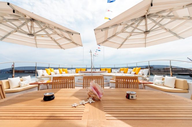 Sun deck with a Jacuzzi and sunbathing area