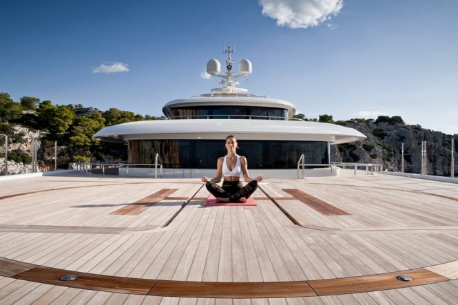 Morning meditation and yoga aboard O'PTASIA superyacht available in the Mediterranean