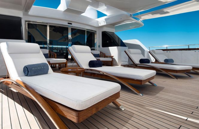 Lie back and relax on the upper deck sun loungers