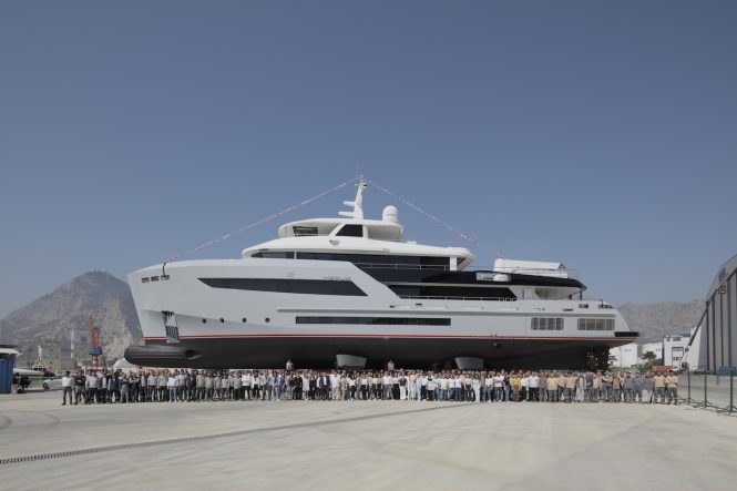 Superyacht HEEUS with the team that worked on her realisation