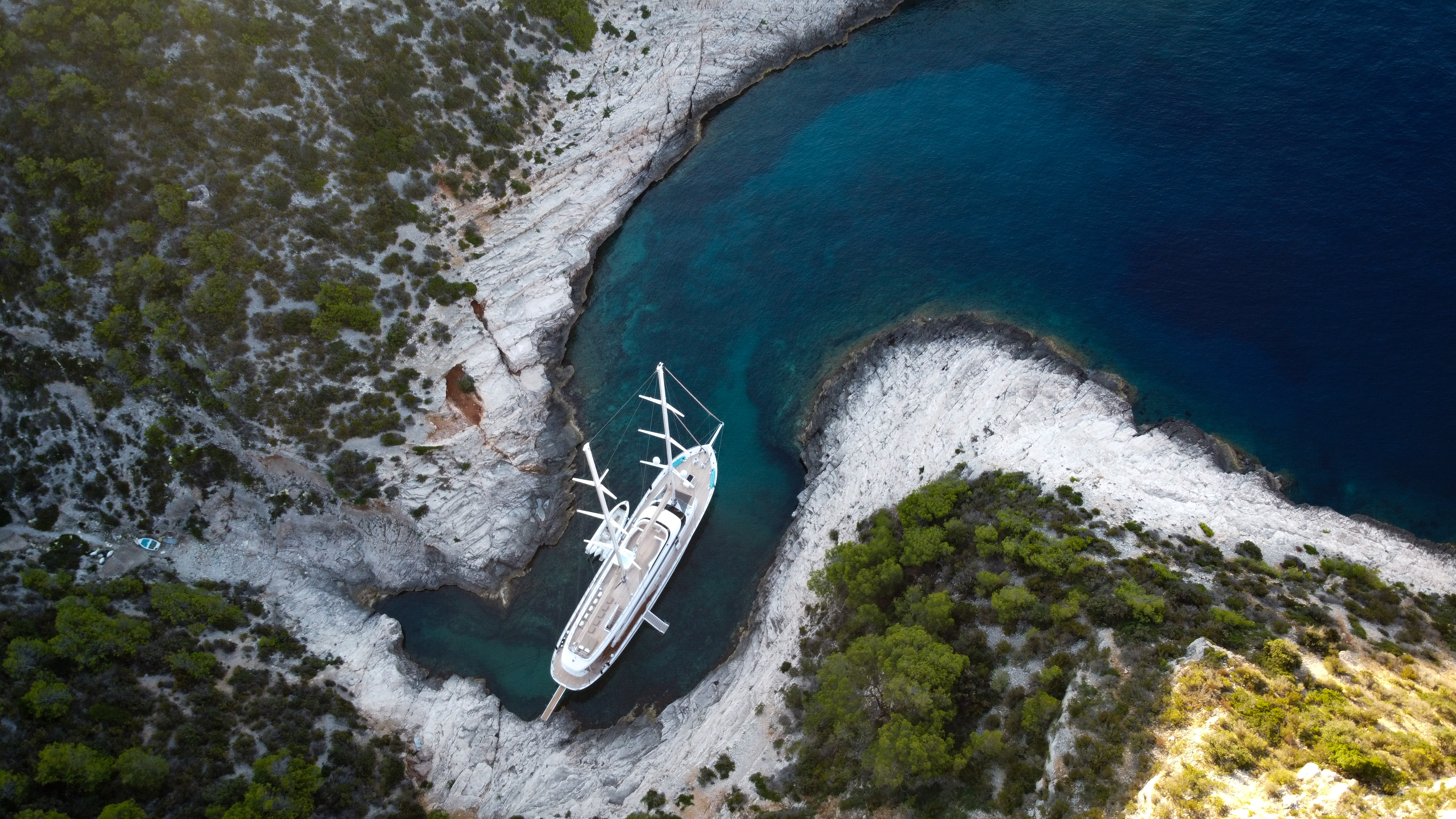 Luxury motor sailer yacht ACAPELLA in a secluded bay in Croatia