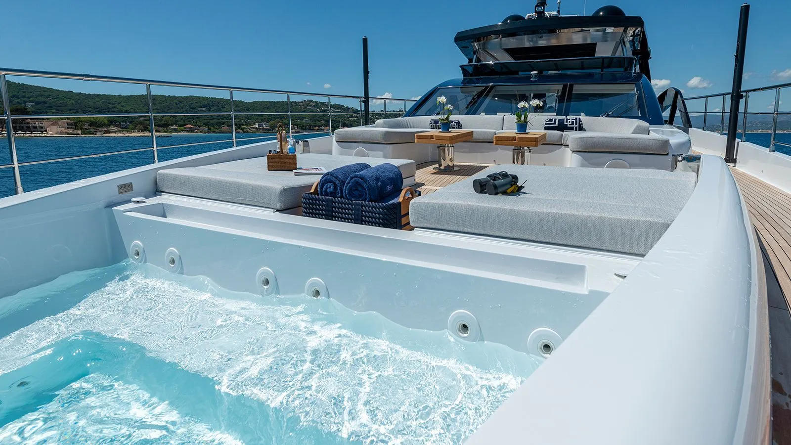 Bow sunbathing and glass fronted jacuzzi
