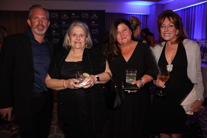 LJ Houghting of CharterWorld (third from left) attending the Seakeepers Event