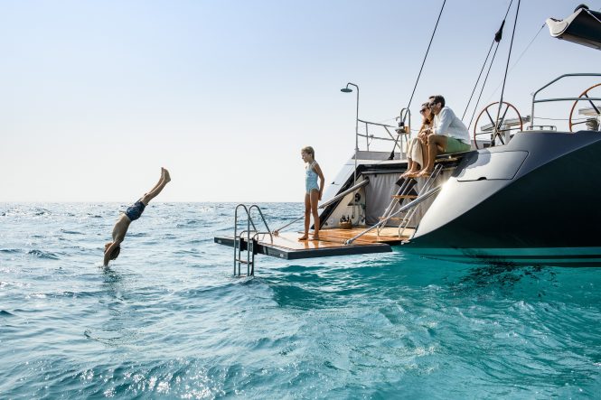 Enjoying the water's edge swim platform