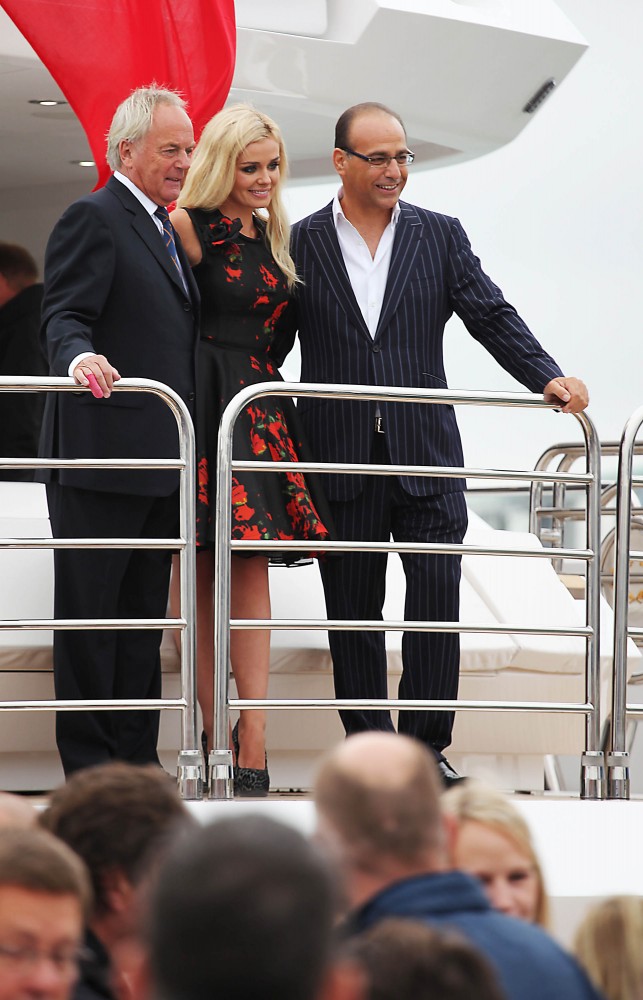 Robert Braithwaite and Theo Paphitus cutting the ribbon on board of the Sunseeker 40 m motoryacht - Image courtesy of Sunseeker