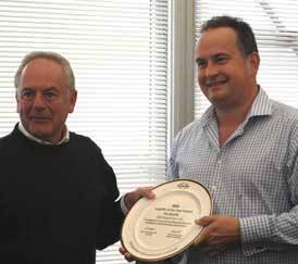 Sunseeker’s CEO, Robert Braithwaite presents the award to Mark Russell, Managing Director at CJR Sunseeker’s CEO, Robert Braithwaite presents the award to Mark Russell, Managing Director at CJR