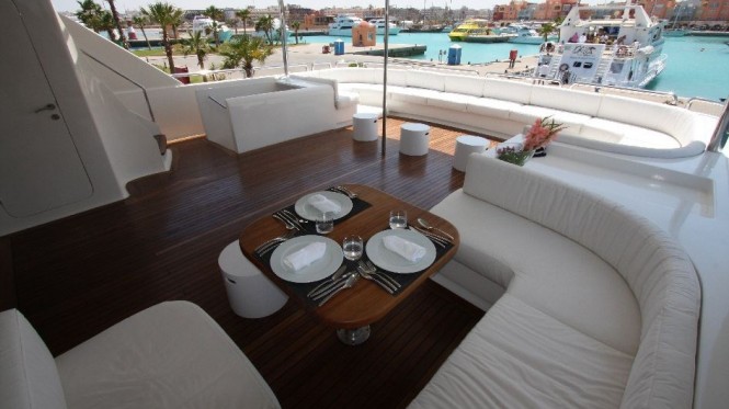 Al Fresco dining on board of the Red Sea charter yacht Seven Spices - Image Luxury Motor Yachts Inc Al Fresco dining on board of the Red Sea charter yacht Seven Spices - Image Luxury Motor Yachts Inc