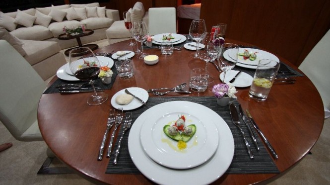 Dining on board of M/Y Seven Spices - Image by Luxury Motor Yachts Inc Dining on board of M/Y Seven Spices - Image by Luxury Motor Yachts Inc