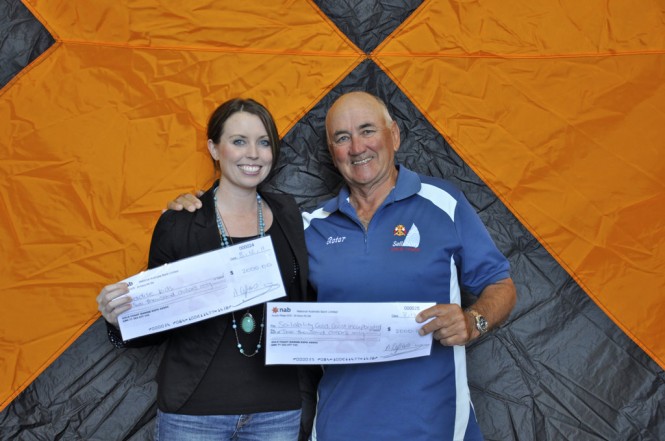 Brodie Sheiles from Paradise Kids and Peter Board from Sailability with their cheques from GCME (2) Brodie Sheiles from Paradise Kids and Peter Board from Sailability with their cheques from GCME (2)