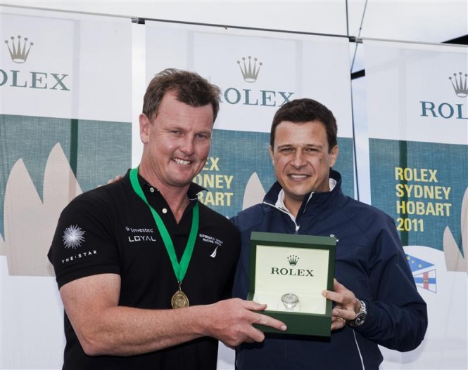 Line Honours Prizegiving Ceremony Anthony Bell, owner of INVESTEC LOYAL and Patrick Boutellier, Rolex Australia Photo D. Foster Line Honours Prizegiving Ceremony Anthony Bell, owner of INVESTEC LOYAL and Patrick Boutellier, Rolex Australia Photo D. Foster