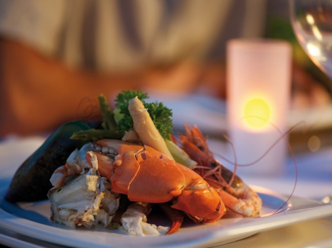 Dinner at sunset aboard luxury TAHITI charter yacht MISS KULANI - Photo by Tim McKenna Photography©