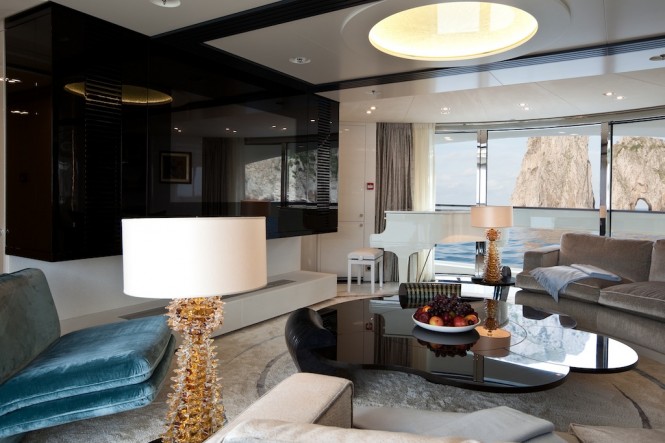 Luxury Superyacht Quinta Essentia - Main saloon with the baby grand piano in the background Luxury Superyacht Quinta Essentia - Main saloon with the baby grand piano in the background