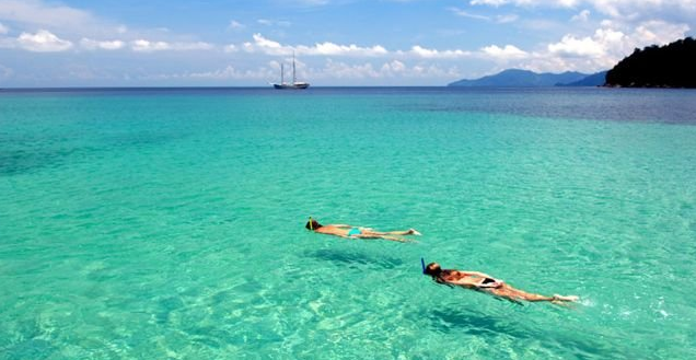 Relax and enjoy the surroundings while cruising aboard sailing yacht RAJA LAUT Relax and enjoy the surroundings while chartering sailing yacht RAJA LAUT