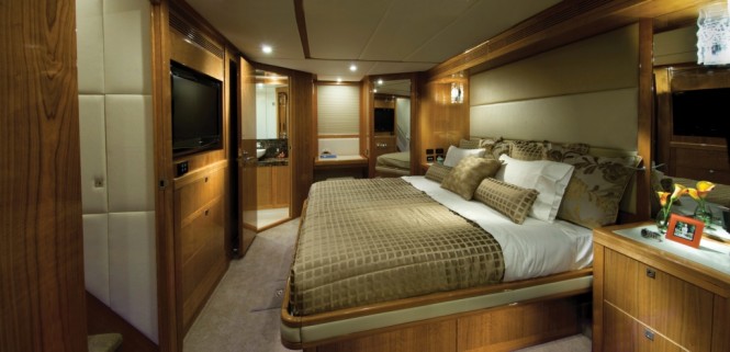 The 75 yacht has four cabins each with its own ensuite including the master stateroom (pictured) with full beam king-sized bed The 75 yacht has four cabins each with its own ensuite including the master stateroom (pictured) with full beam king-sized bed