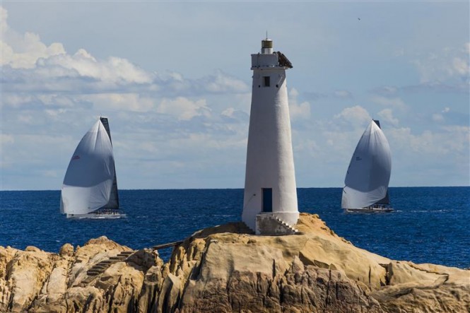 Luxury yachts Shockwave and Ran approach the lighthouse at Monaci - Photo by Rolex Carlo Borlenghi Luxury yachts Shockwave and Ran approach the lighthouse at Monaci - Photo by Rolex Carlo Borlenghi