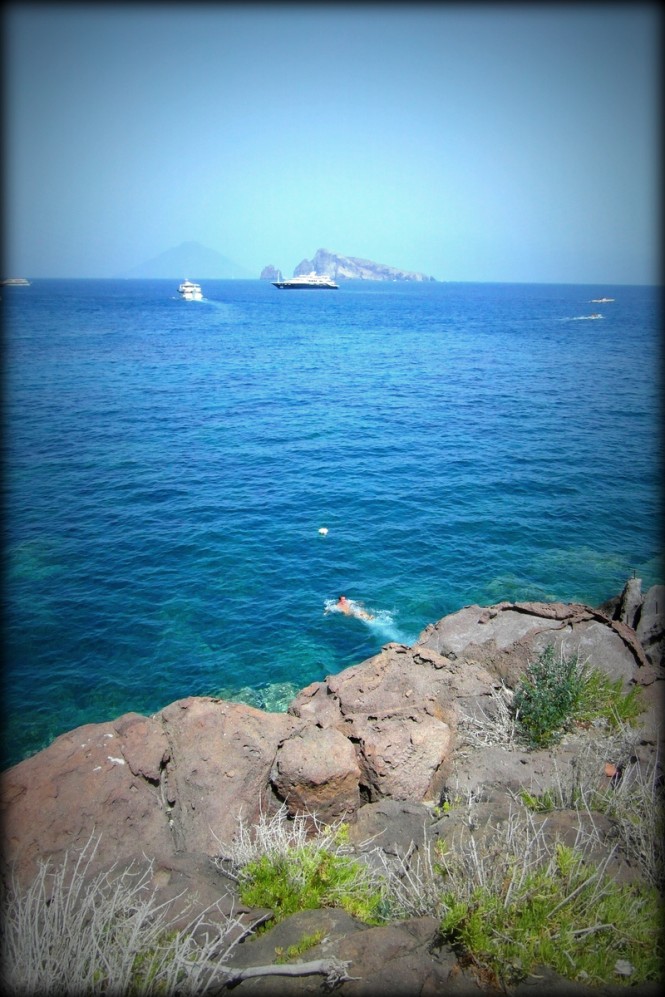 Luxury Yacht Lyana in distance near Panarea - Aeolian Islands - Italy Luxury Yacht Lyana in distance near Panarea - Aeolian Islands - Italy